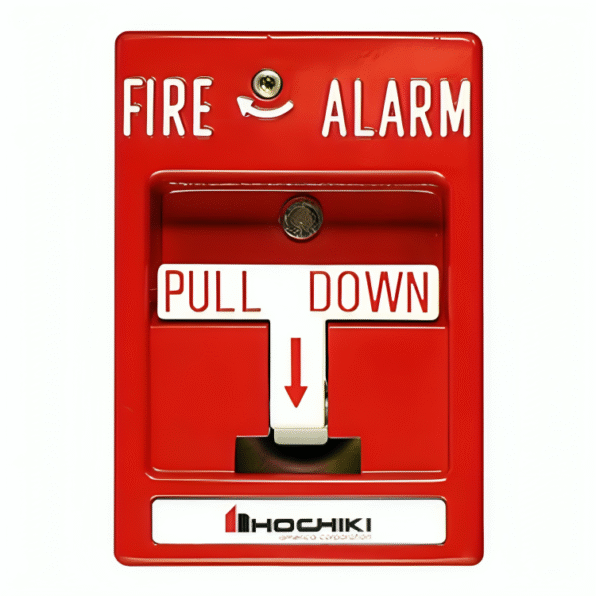 A person activating the Hochiki DCP-AMS manual pull station installed on a wall.